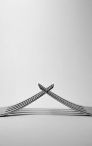 photo of stainless steel forks in white background